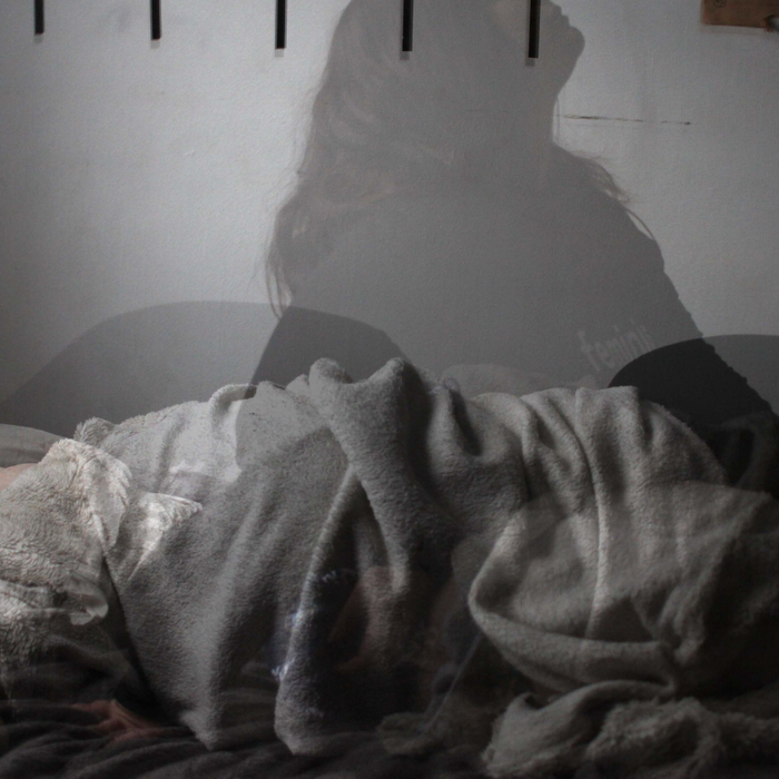 Woman in and out of insomnia