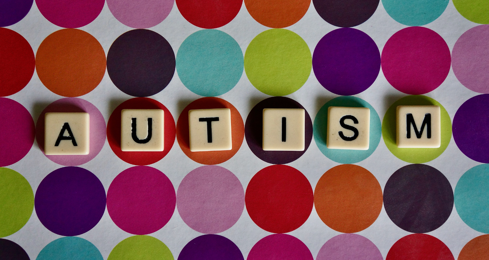 Scrabble pieces spelling out the word Autism