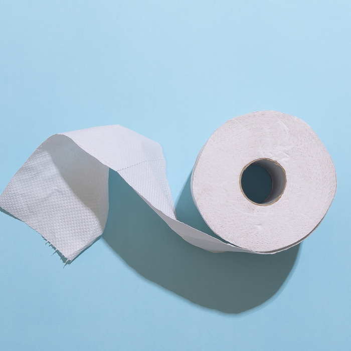 toilet roll on a blue background