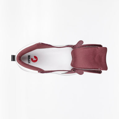 Maroon & white trainer photographed from above with white insole on a white background. Trainers two side zips are fully unzipped showing full access to the inside