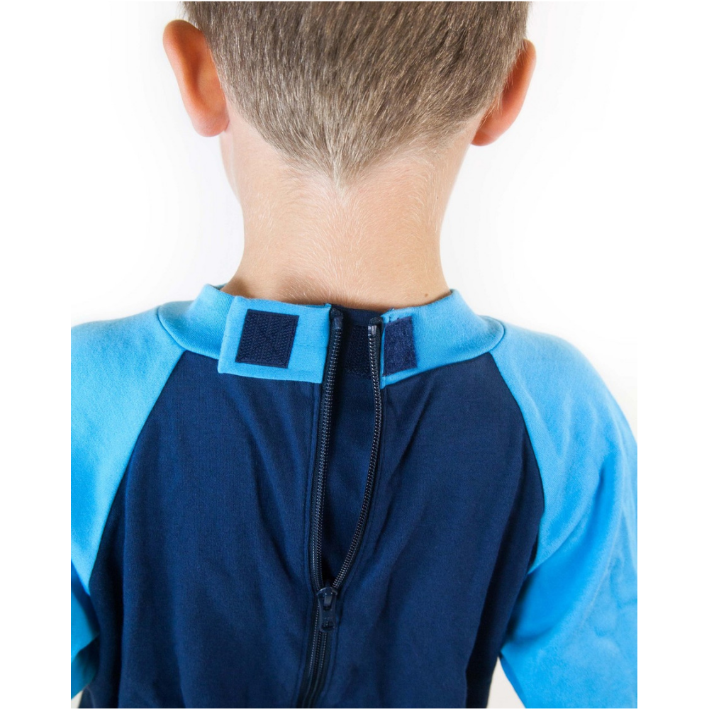 Seenin_footed_sleepsuit_with_closed_feet_blue_pajamas_for_boys_with_special_needs_with_zip_back_hook_and_loop_fastening